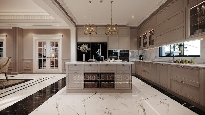 Sắp xếp nội thất phòng bếp sang trọng ấn tượng với bộ tủ bếp tân cổ điển cao cấp, quý phái. Thiết kế nội thất biệt thự