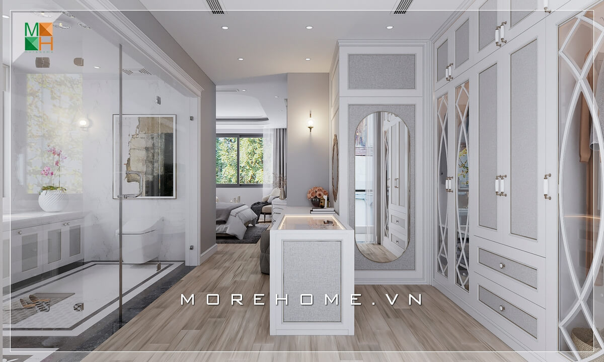 Morehome xin giới thiệu cho bạn mẫu phòng ngủ phong cách tân cổ điển với phòng thay đồ ở trung tâm giúp liên kết không gian phòng ngủ với phòng tắm, tận dụng triệt để diện tích sử dụng và mang lại sự thuận tiện cho sinh hoạt hàng ngày. Mẫu nội thất biệt thự tân cổ điển đẹp